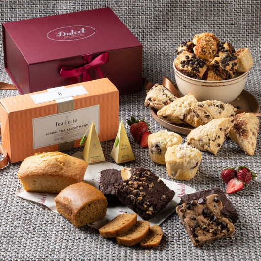 Deluxe Tea and Food Gift Basket Gourmet Present Featuring Old Fashioned Scones, Cheese Brownie, Fudge and Brownie, Muffins, and more plenty to please a crowd. By Dulcet Gift Baskets