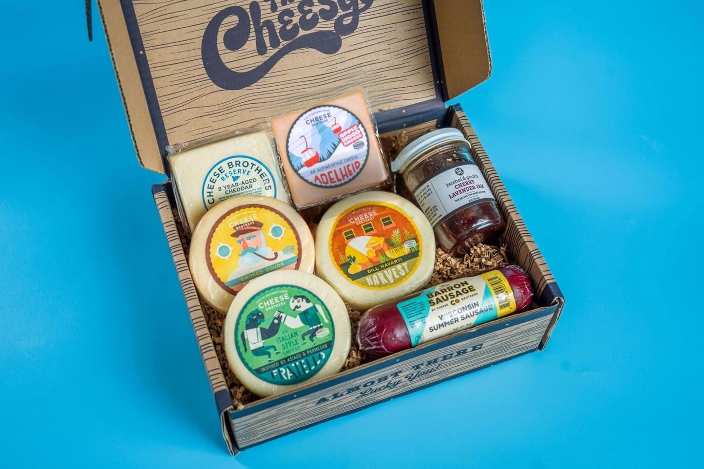 Cheese Bros. Charcuterie Gift Box | Fresh from Wisconsin | Includes Dill Havarti, Fratello, Smoked Gouda, Alpine Adelheid, 8 Year Aged Cheddar, Summer Sausage and Jam | Great Food Gifting Idea